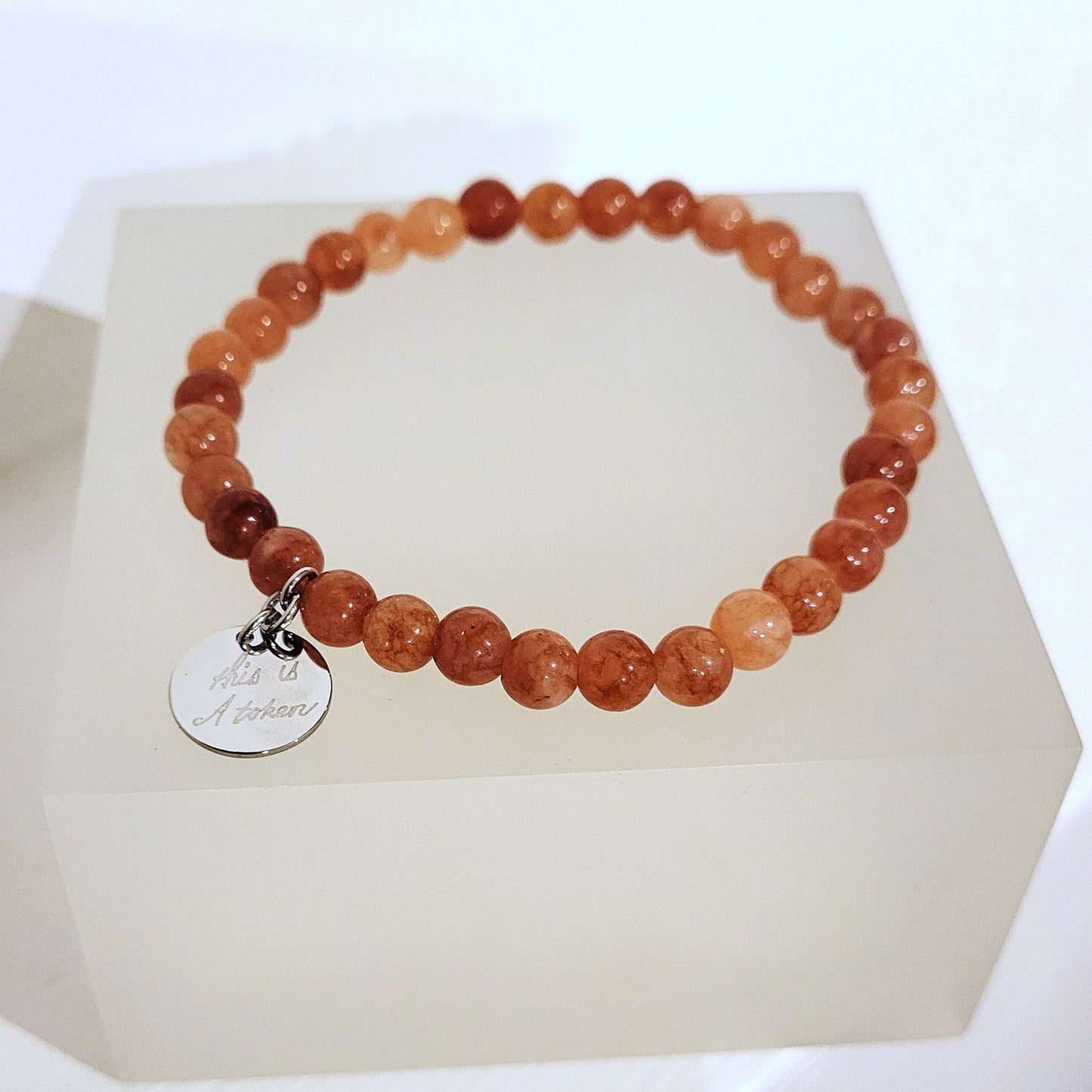 This is A Token Agate Bracelet with Pendant